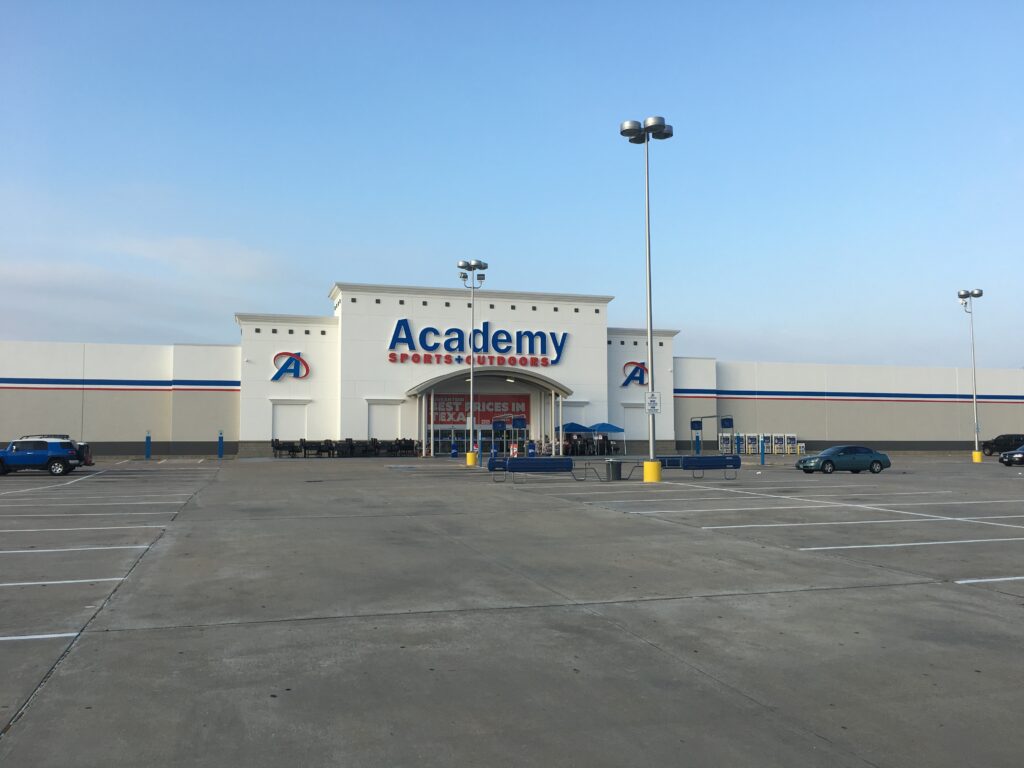 Commercial pressure washing services for an Academy Sports & Outdoors center in Houston, TX.