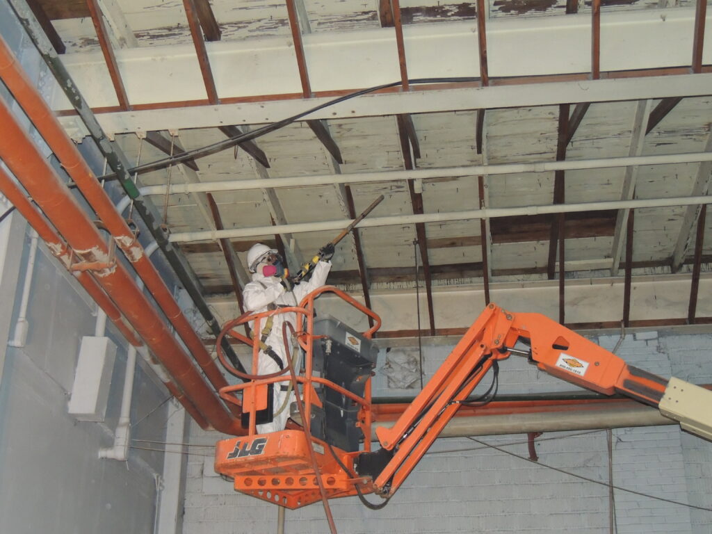 Professional painting for an interior roof in a commercial building. 